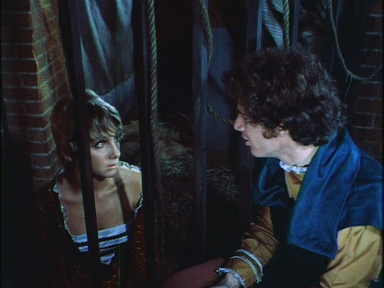 Guru, the Mad Monk - Judith Israel as Nadja, Paul Lieber as Carl, and prison bars you could drive a truck through Guru, the Mad Monk - Judith Israel as Nadja, Paul Lieber as Carl, and prison bars you could drive a truck through