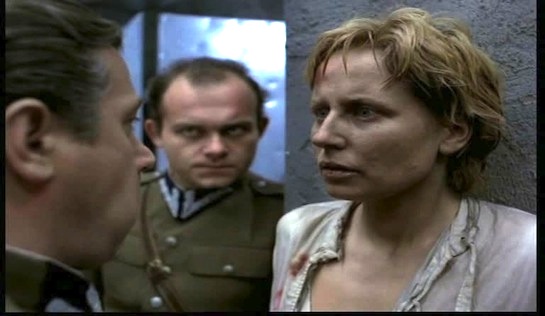 Interrogation - Janusz Gajos as Major Zawada, Adam Ferency as Lieutenant Morawski, and Krystyna Janda as Antonina Dziwisz Interrogation -